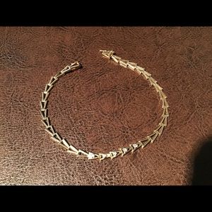 14k Gold Bracelet with 5 tiny crystals.